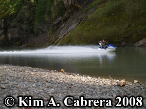 people on the
                      river on jet skis. Photo Copyright Kim A. Cabrera
                      2008.